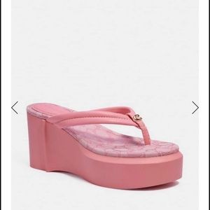 Brand new Coach platform sandal.